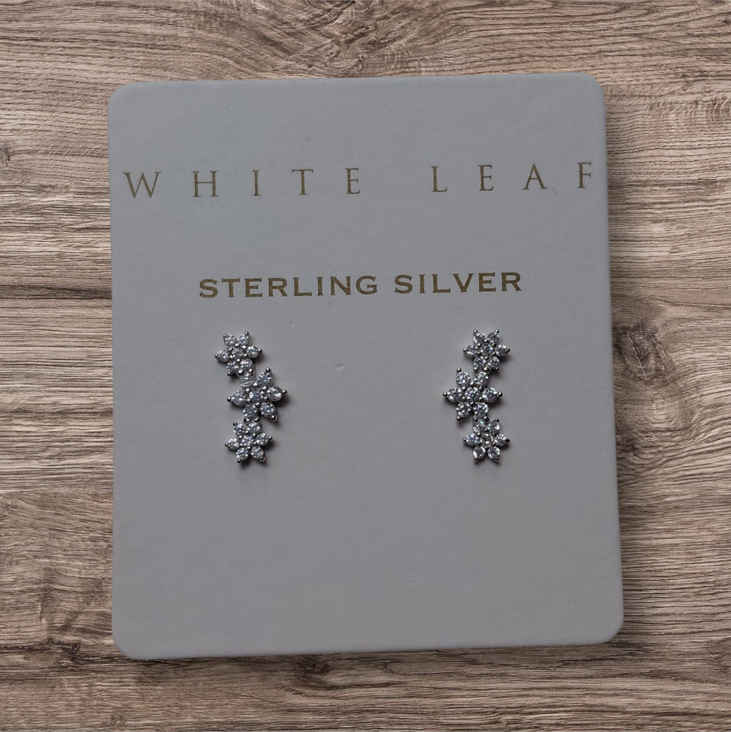White Leaf Triple Flower CZ earrings in Sterling-Silver